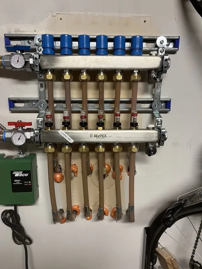 Plumber performing Water Heater Repair at a residential property in Eustis